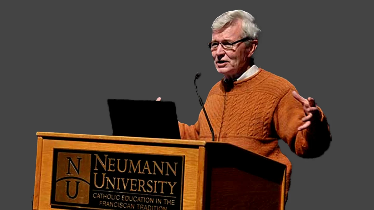 Bruce K. Alexander durante uma apresentação.